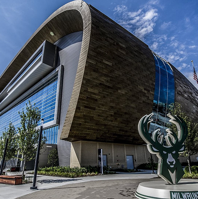 Bucks The outside of Fiserv Forum features a curved roofline.