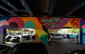 This underpass mural features bright circles of color.