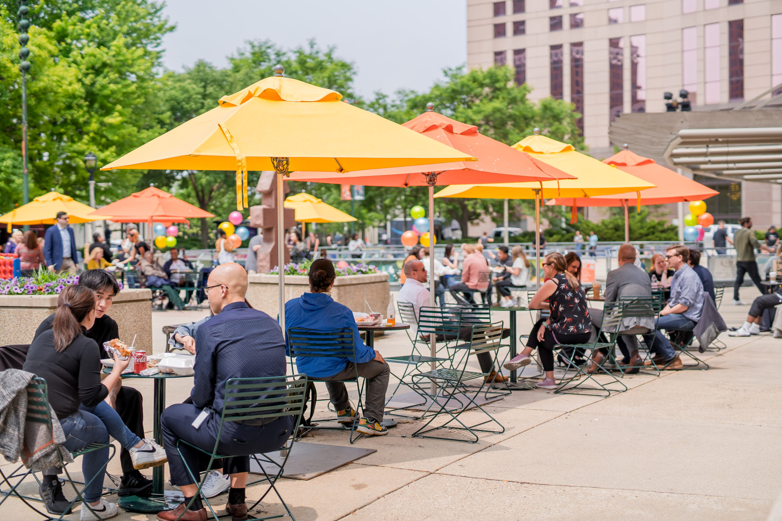 FRPhoto_230614L_C1_095 Adults eating at Red Arrow Park tables.