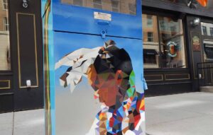 Mo’sIrishPub_UtilityBox1 This utility box mural pays tribute to the indigenous populations that call Milwaukee home.