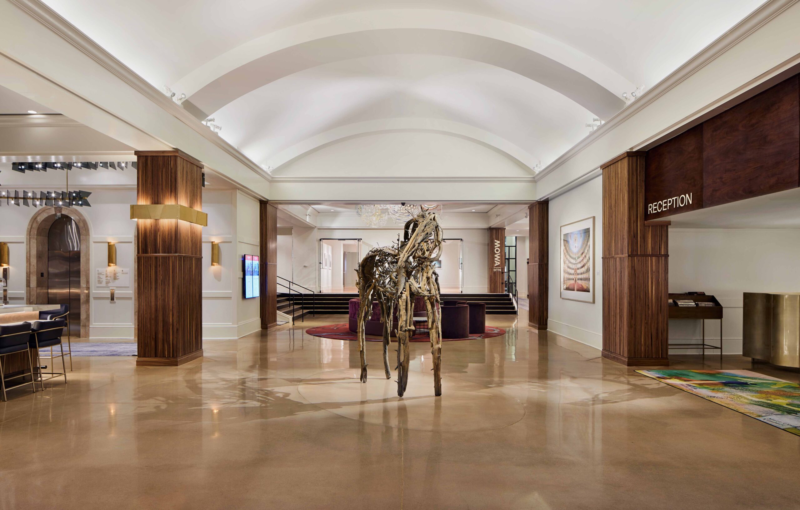Trinity The Saint Kate lobby features a sculpture of a horse.