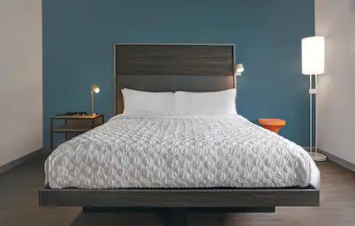 Thanks A Lot A bed in the Tru by Hilton hotel.