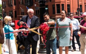 Utility Box Ribbon Cutting The mayor at the ribbon cutting of the utility box murals.