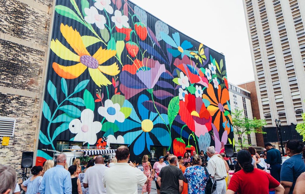 Westown Gateway Mural – Ribbon-Cutting2 The ribbon cutting ceremony in front of the new Westown mural.