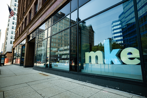 Storefront with MKE letters A storefront with MKE letters shown in the window.