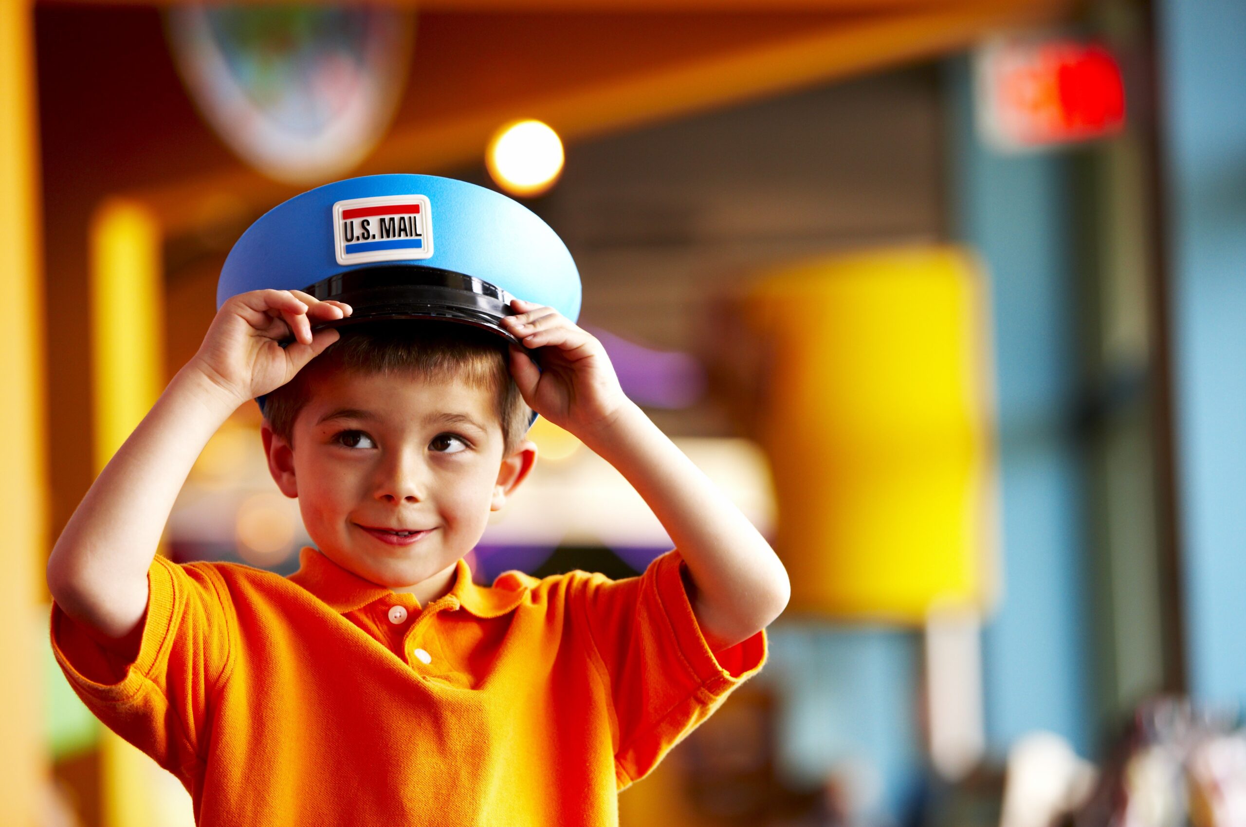 BettyBrinnPostman-08067 Little boy with a US Mail costume hat.