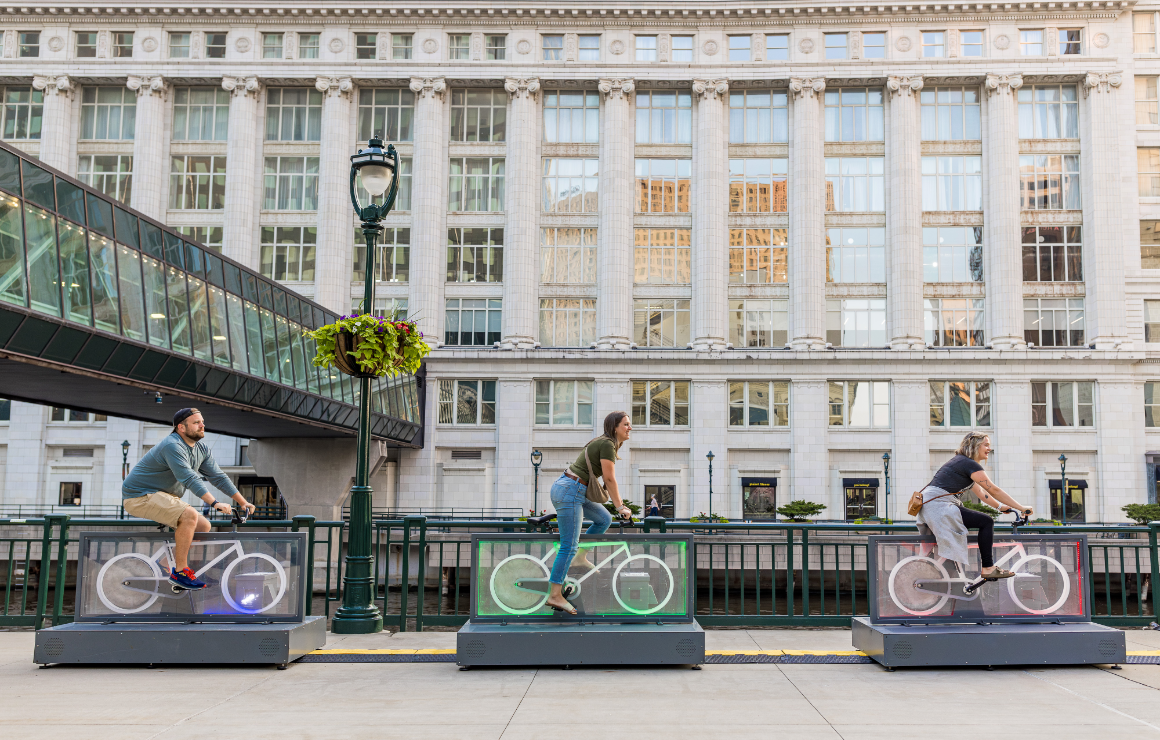 FRPhoto_240711G_C1_017 Three folks ride the Light Lane bicycles.