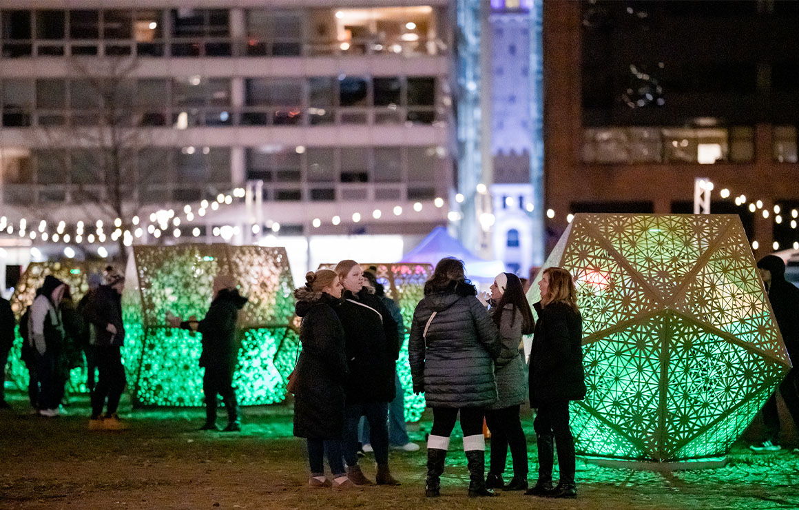 HYBYCOZO_Milwaukee Downtown2 A group gathers at the Lightfield installation.