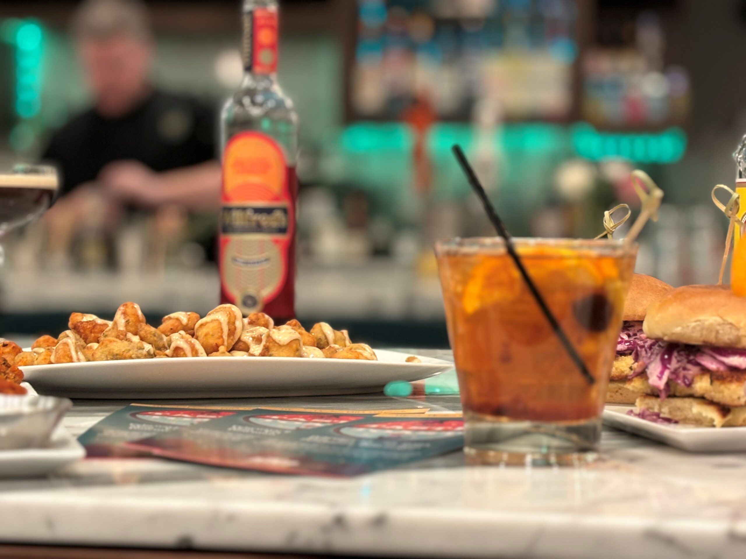 A plate of food and drinks.