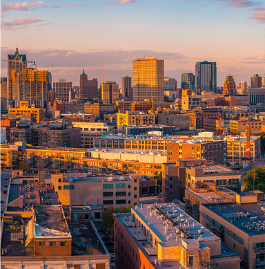 Downtown Milwaukee skyline at sunset.