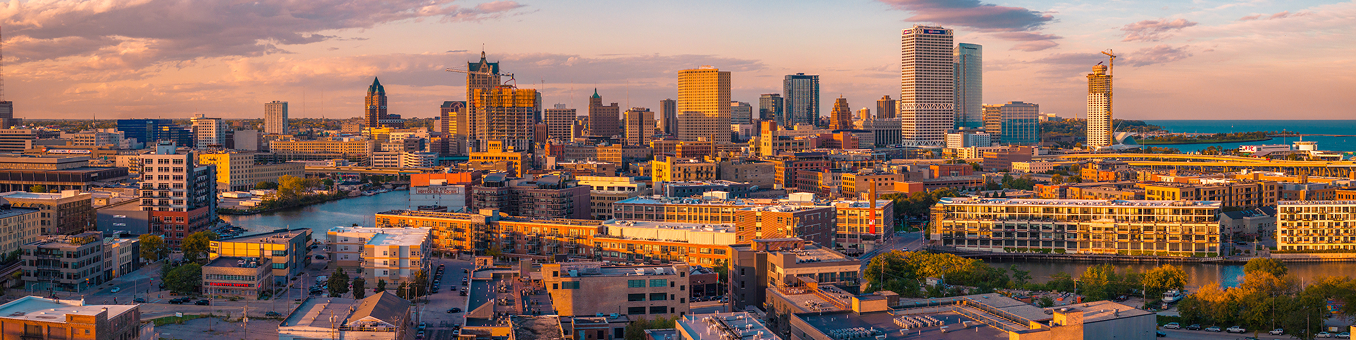 Downtown Milwaukee skyline at sunset.