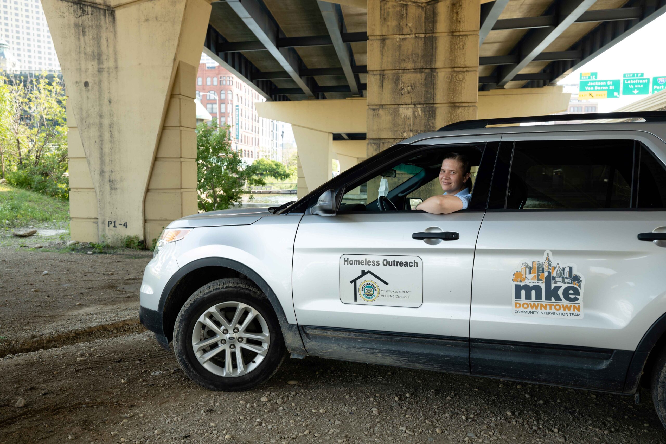 img_corePrograms2020_AFeller-057 A member of the Homeless Outreach team in their car.
