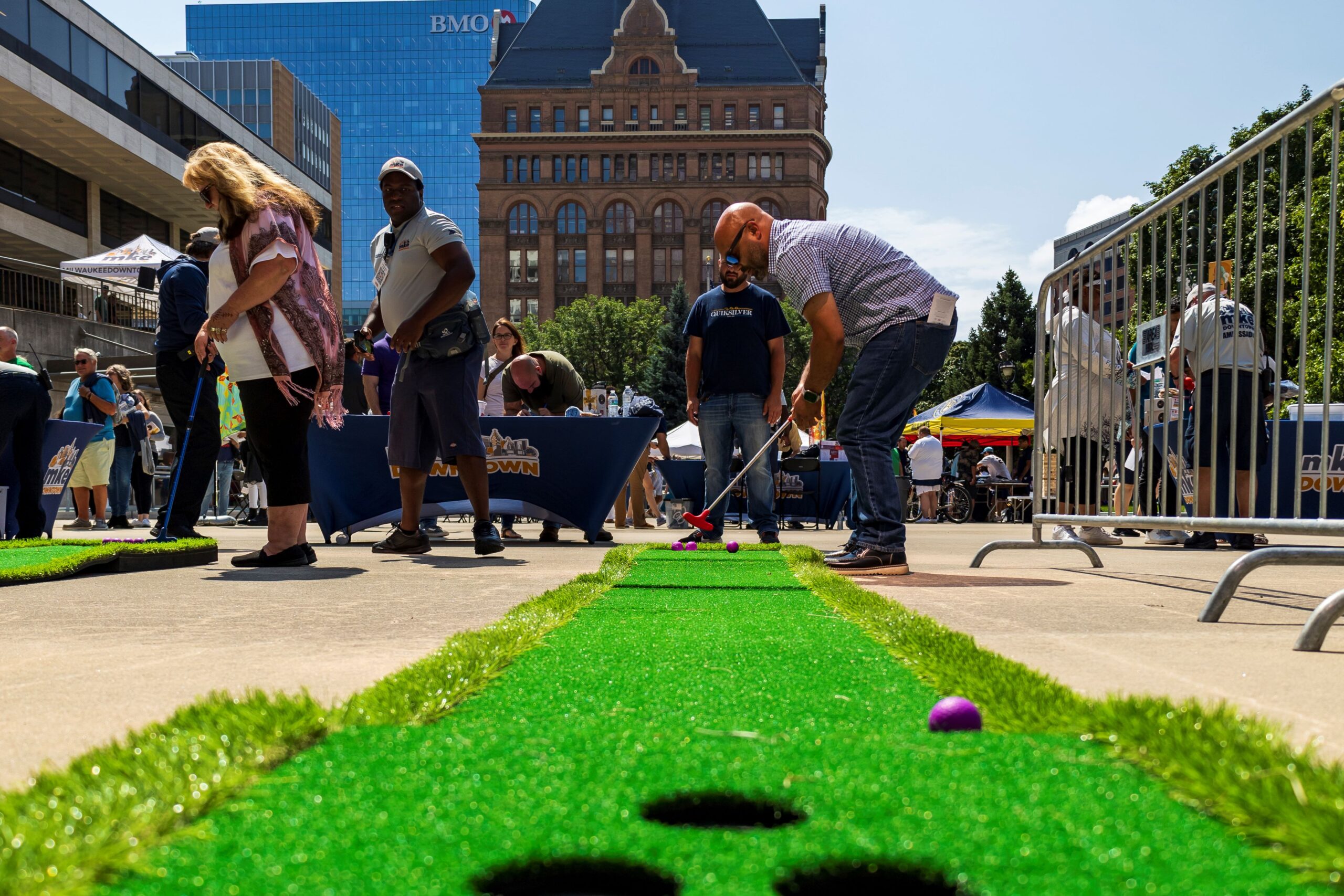 A downtown employee puts on a mini-golf course.