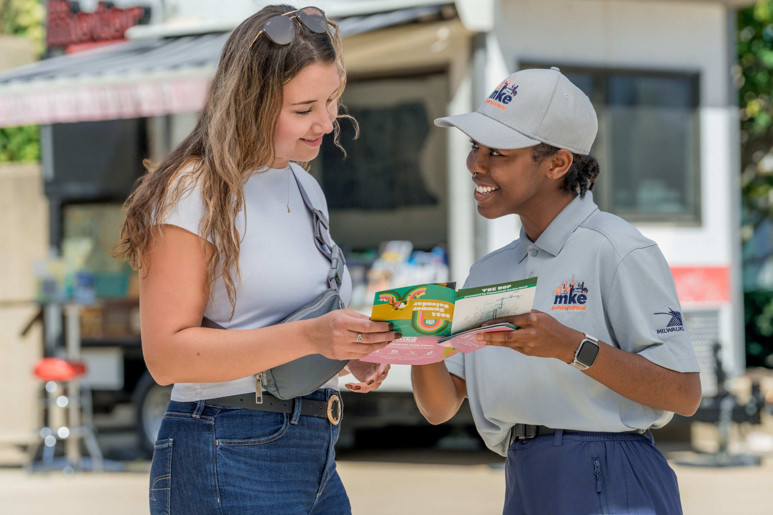 A public service ambassador talking to another person.